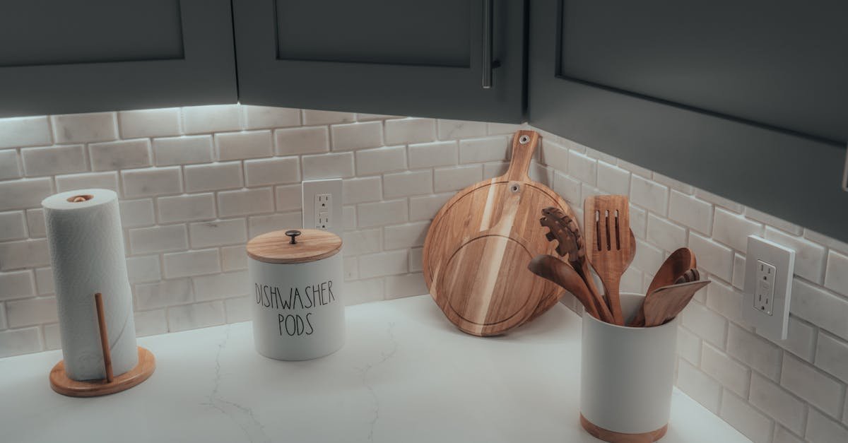 Clean kitchen countertop with utensils and containers