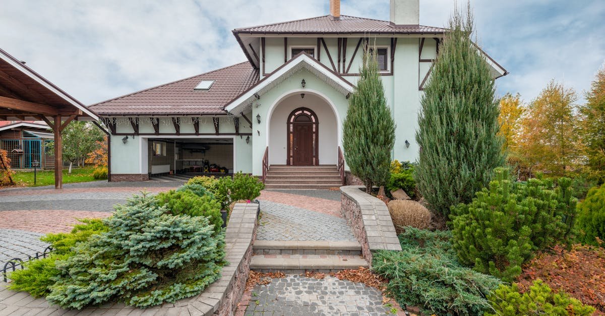 Well-kept suburban house with inviting entry and landscaping