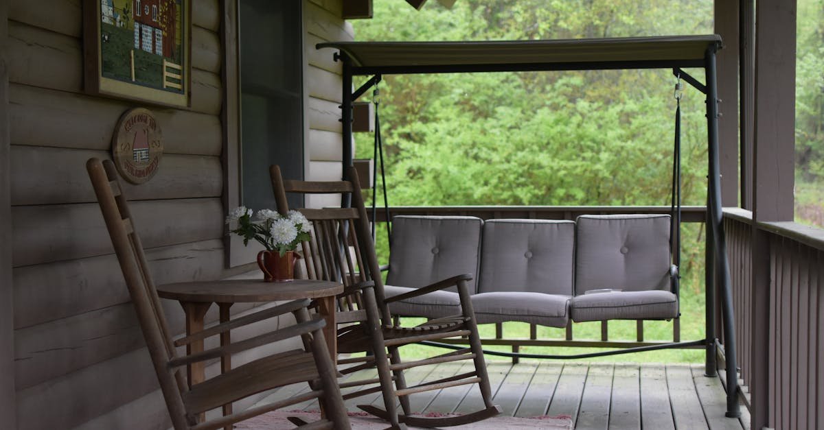 Rustic porch with rocking chairs and a swing