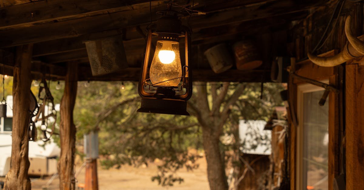 Rustic lantern hanging on a wooden porch